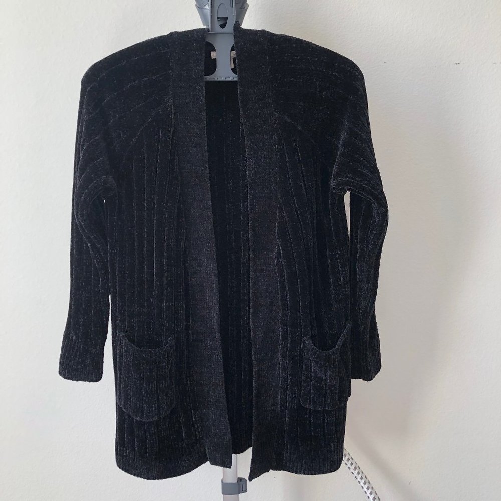 Woman Within Black Sweater